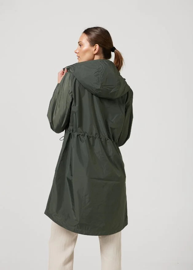 The Juniper deep green hooded raincoat, modern lightweight waterproof raincoat perfect for Australia’s changing weather and rain