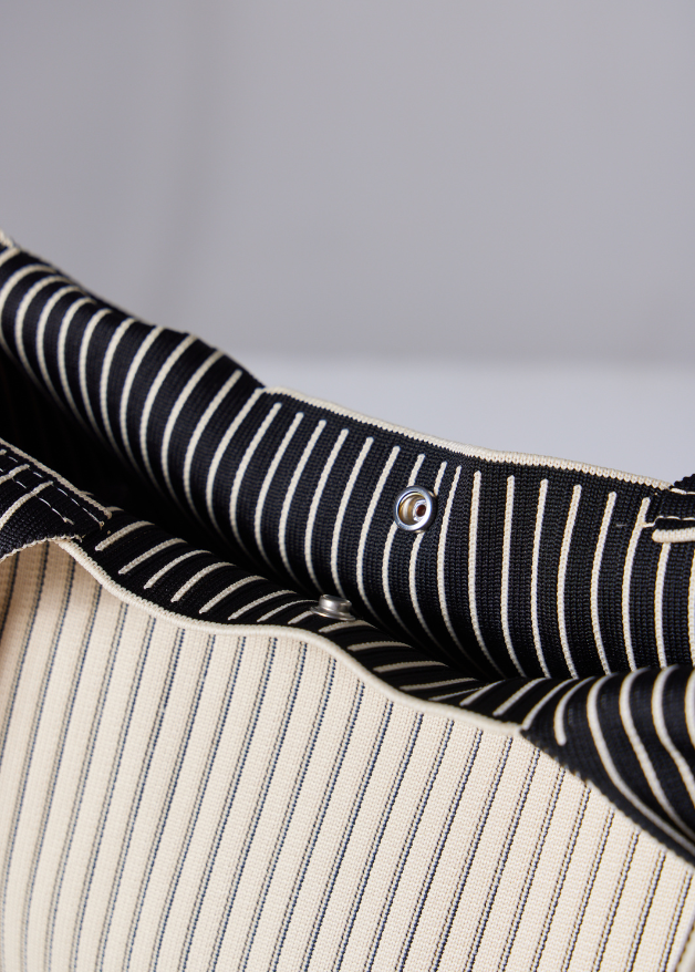 The Duck™ black woven tote bag with white pinstripes, sustainable fabric shopper with embroidered DUCK logo, reusable eco-friendly tote for everyday use