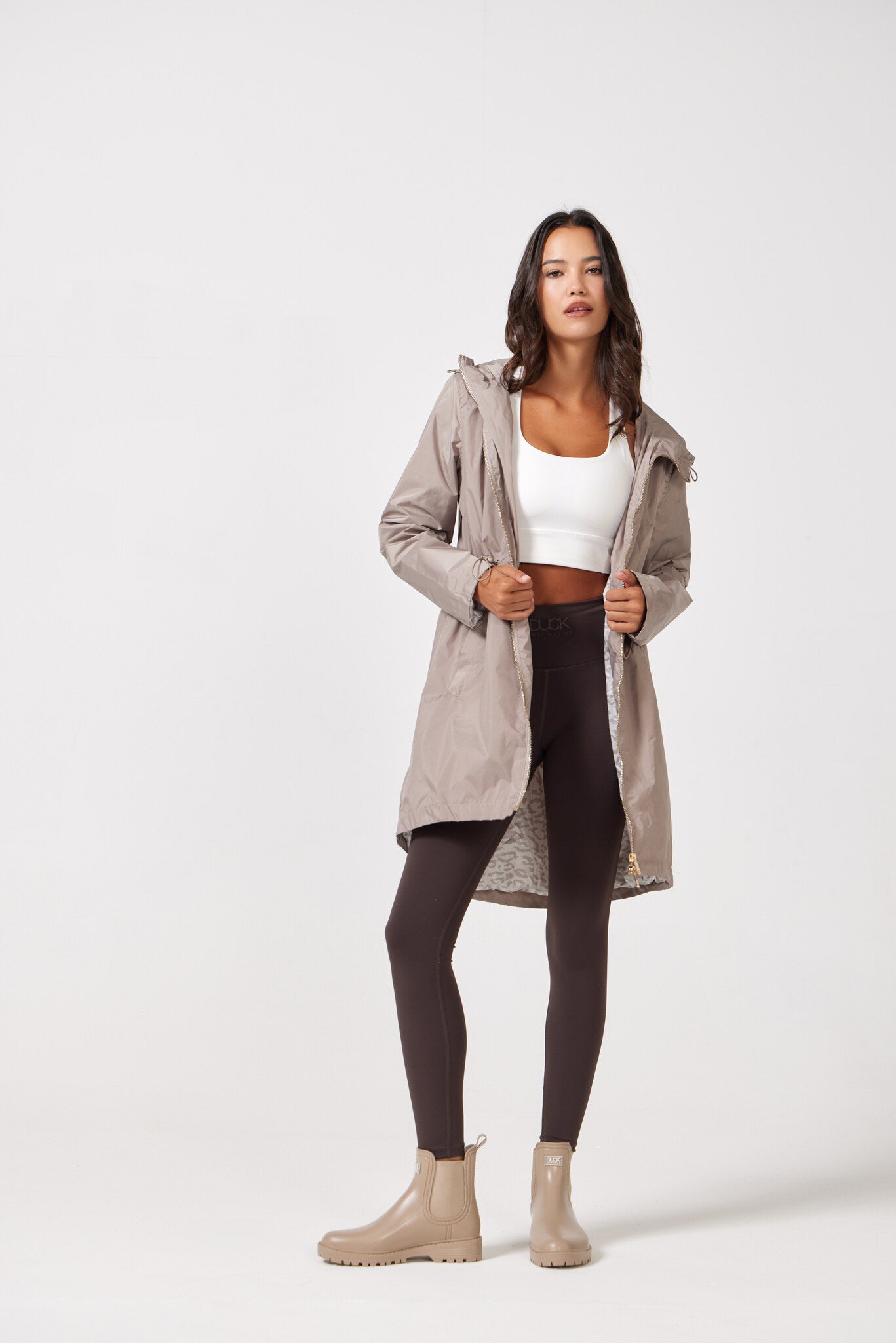 The Cairo Sands raincoat in beige, lightweight hooded waterproof raincoat ideal for Australia rainy season and wet climate