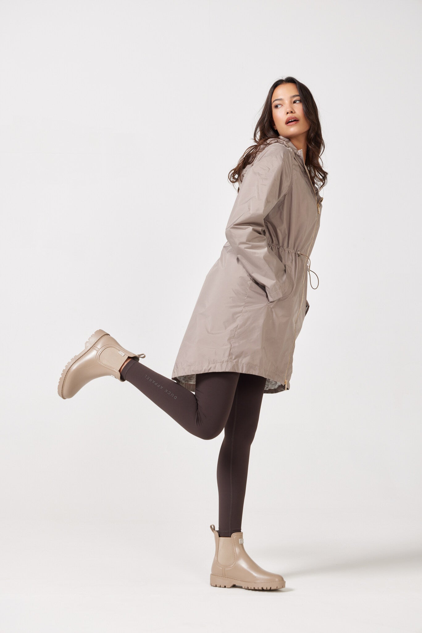 The Cairo Sands raincoat in beige, lightweight hooded waterproof raincoat ideal for Australia rainy season and wet climate