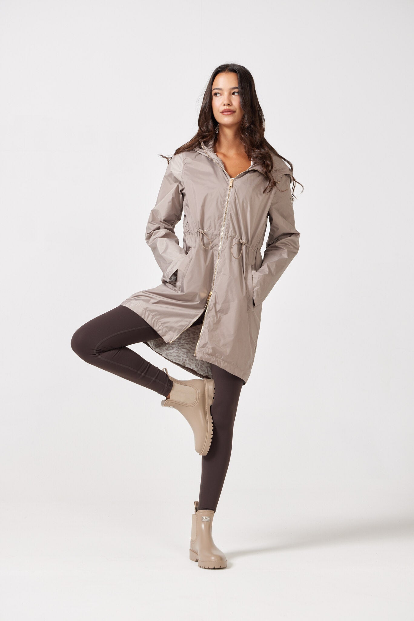 The Cairo Sands raincoat in beige, lightweight hooded waterproof raincoat ideal for Australia rainy season and wet climate