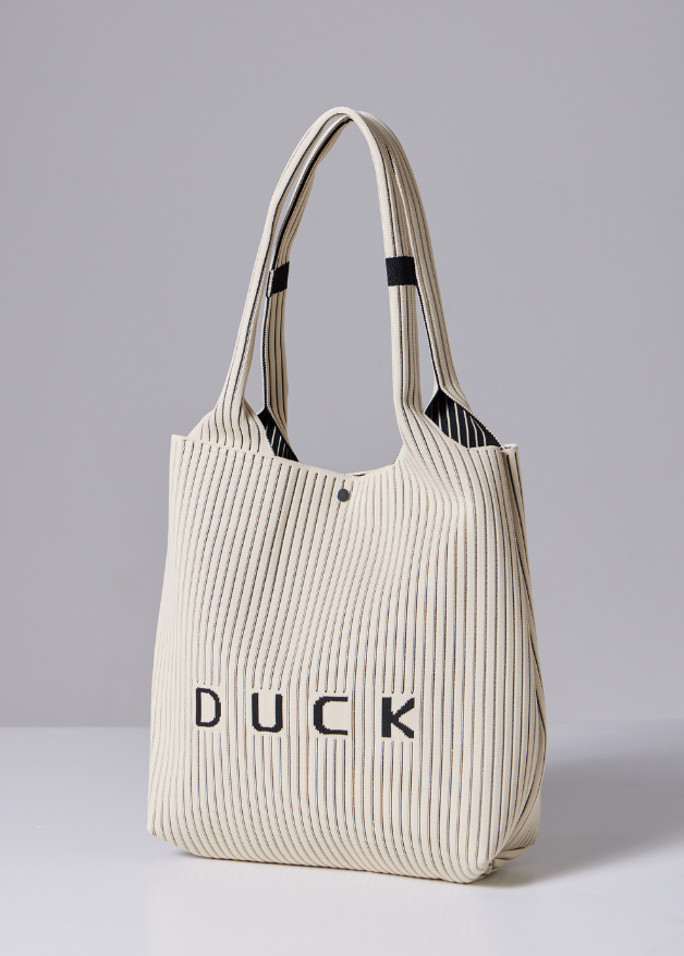 The Duck™ black woven tote bag with white pinstripes, sustainable fabric shopper with embroidered DUCK logo, reusable eco-friendly tote for everyday use