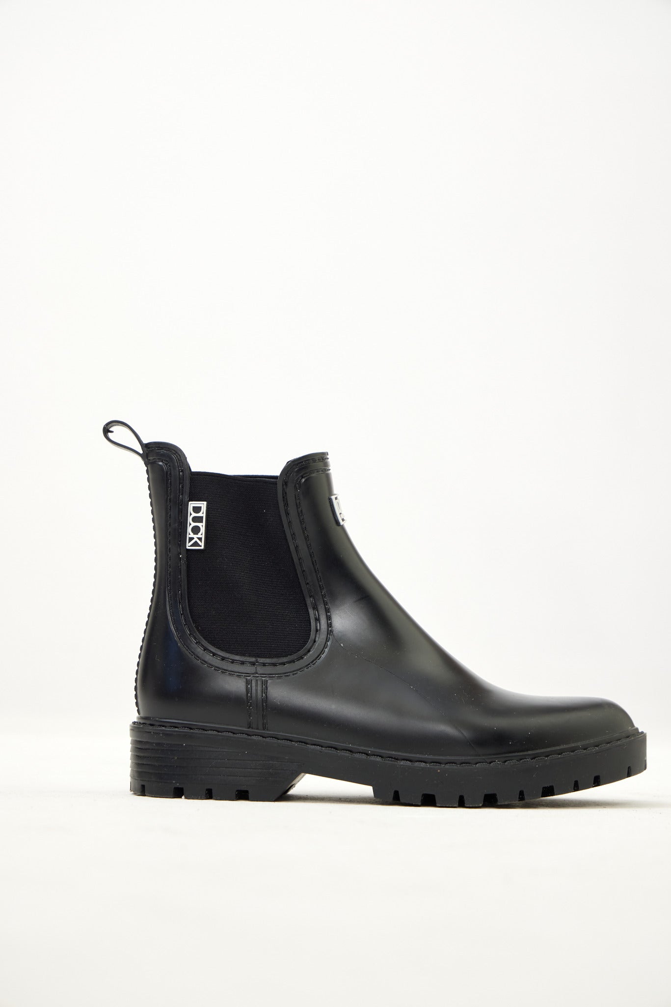 Black Ankle-length gumboots with elastic side panels and durable sole, designed for everyday outdoor and wet-weather use