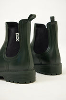Green Ankle-length gumboots with elastic side panels and durable sole, designed for everyday outdoor and wet-weather use