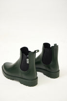 Green Ankle-length gumboots with elastic side panels and durable sole, designed for everyday outdoor and wet-weather use