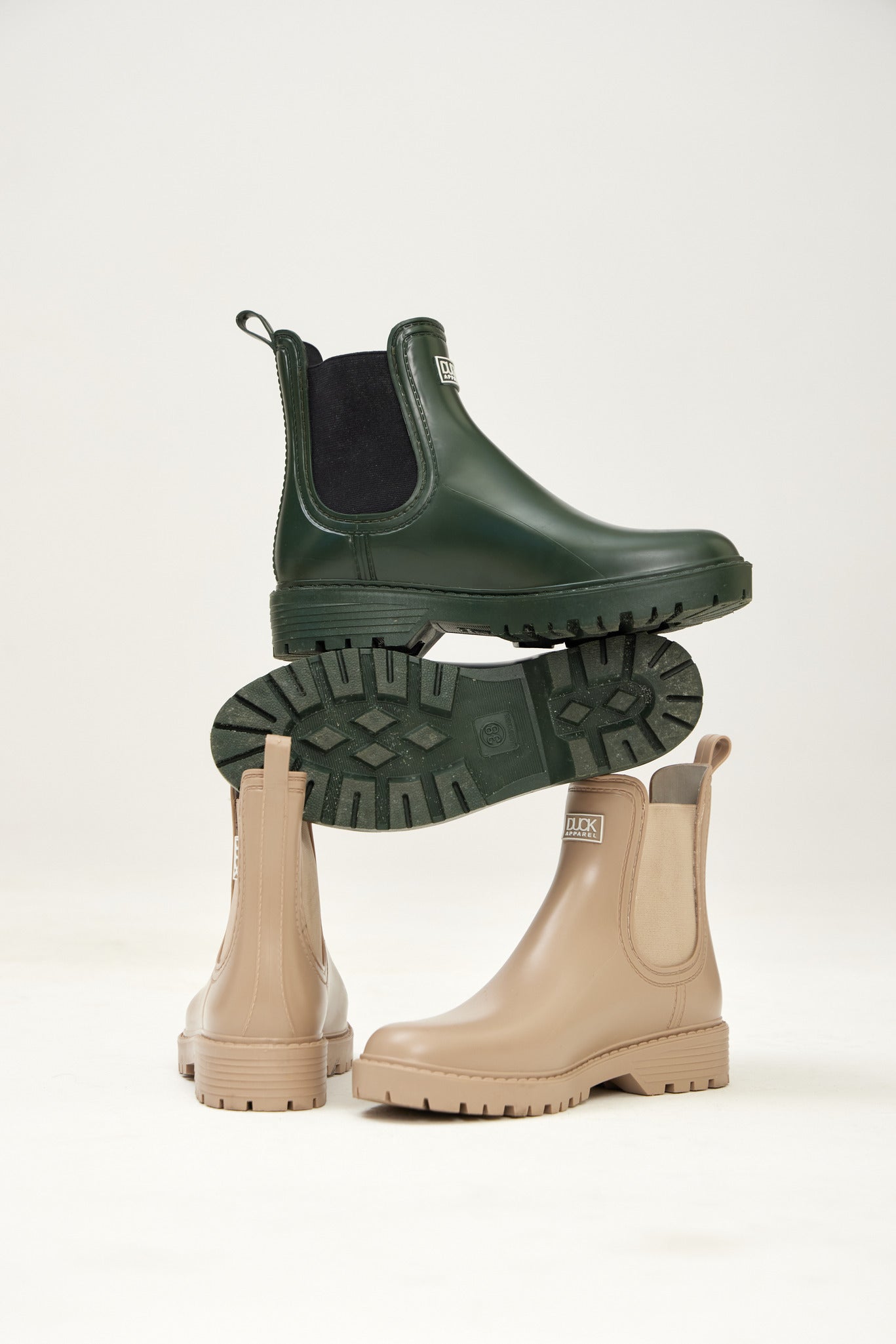 Ankle-length gumboots with elastic side panels and durable sole, designed for everyday outdoor and wet-weather use