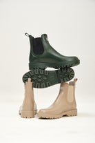 Ankle-length gumboots with elastic side panels and durable sole, designed for everyday outdoor and wet-weather use