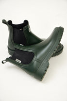 Green Ankle-length gumboots with elastic side panels and durable sole, designed for everyday outdoor and wet-weather use