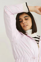 Rosewater Mist pastel pink hooded raincoat, modern lightweight waterproof raincoat perfect for wet weather in Australia.