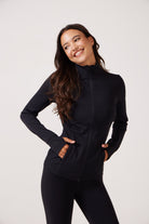 Black Lightweight performance jacket with a smooth, sculpting fit, full zip front, high collar, and stretch fabric designed for everyday movement and layering.