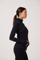 Black Lightweight performance jacket with a smooth, sculpting fit, full zip front, high collar, and stretch fabric designed for everyday movement and layering.
