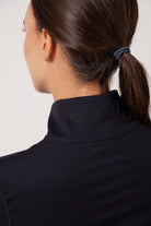 Black Lightweight performance jacket with a smooth, sculpting fit, full zip front, high collar, and stretch fabric designed for everyday movement and layering.