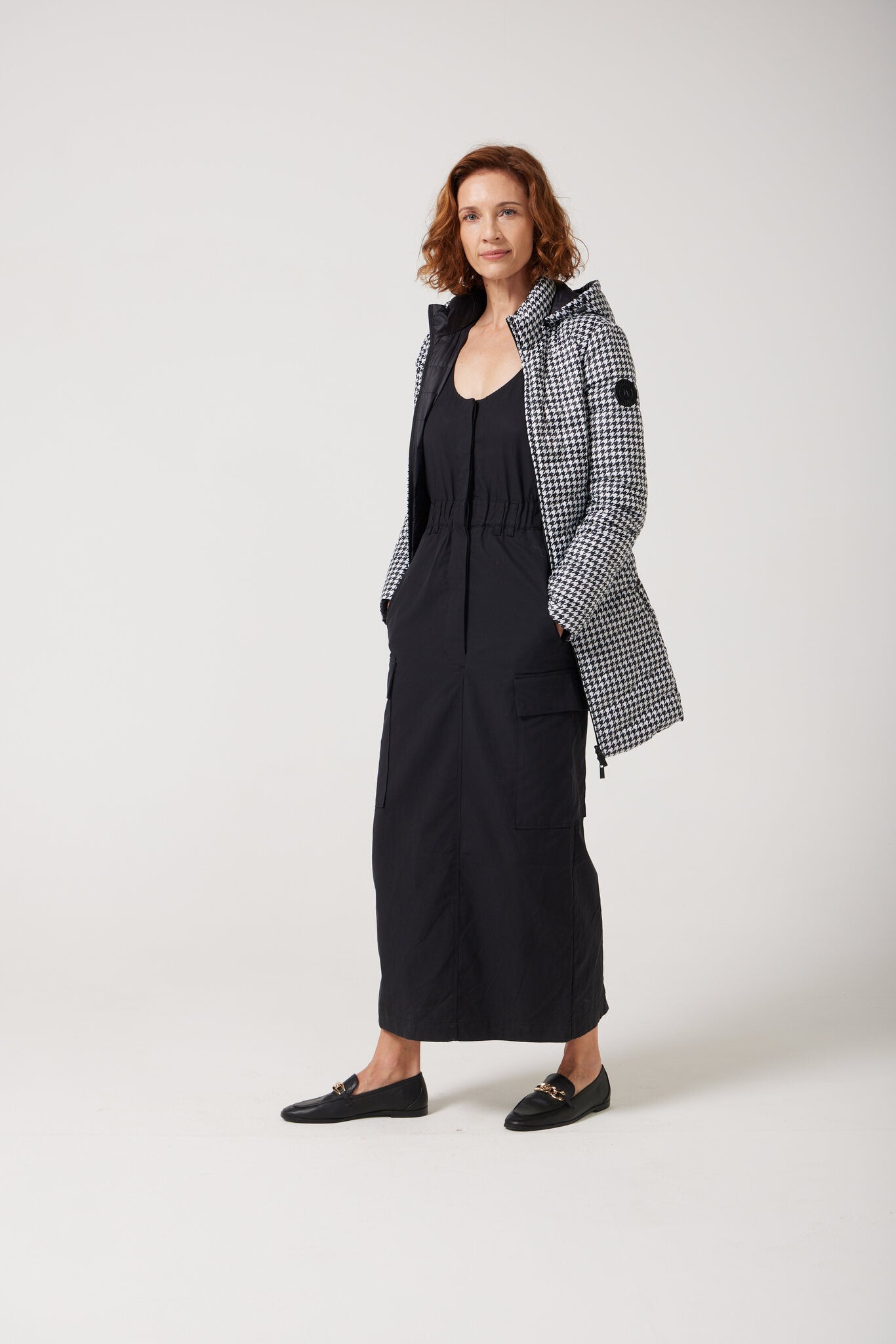 Women’s houndstooth print and midnight black reversible insulated parka with hood, warm winter parka perfect for layering in Australia’s cooler weather — Midnight x Houndstooth Classic Parka™