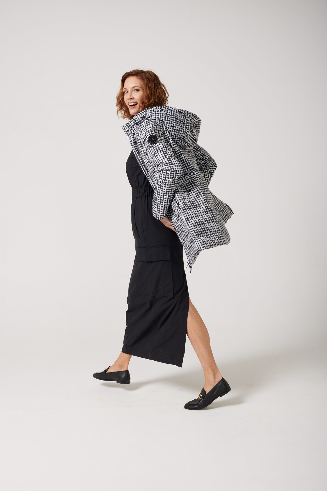 Women’s houndstooth print and midnight black reversible insulated parka with hood, warm winter parka perfect for layering in Australia’s cooler weather — Midnight x Houndstooth Classic Parka™