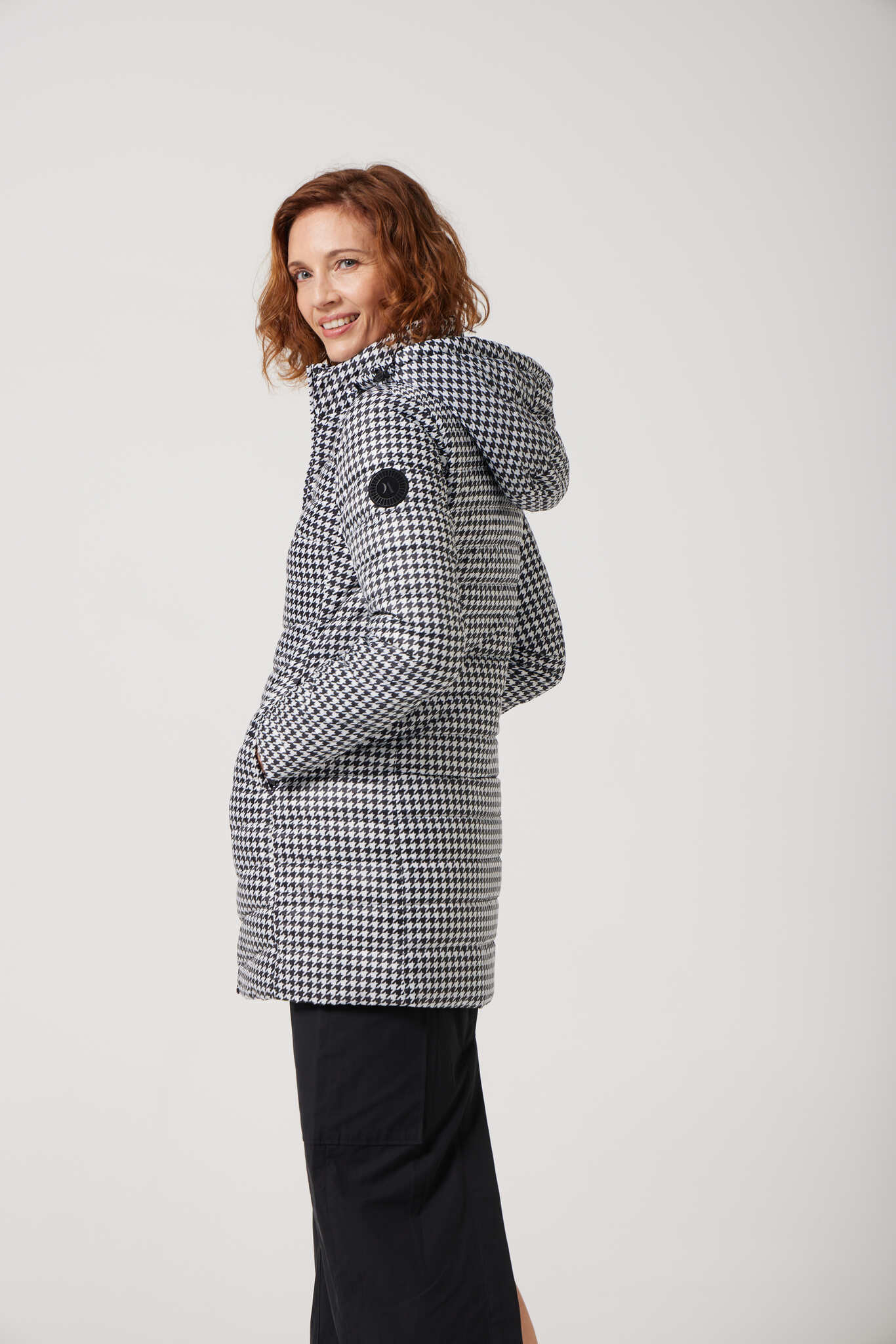 Women’s houndstooth print and midnight black reversible insulated parka with hood, warm winter parka perfect for layering in Australia’s cooler weather — Midnight x Houndstooth Classic Parka™