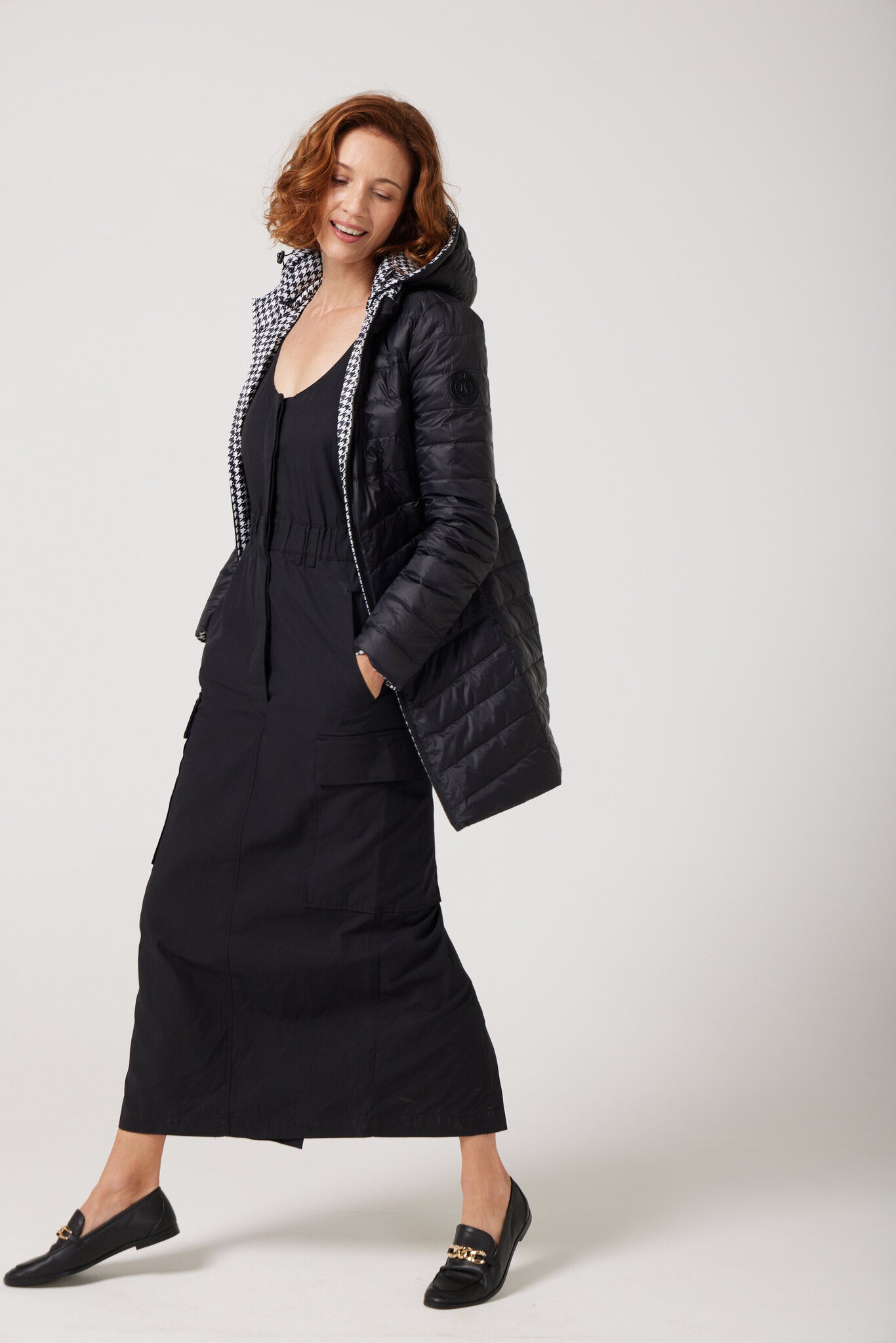 Women’s houndstooth print and midnight black reversible insulated parka with hood, warm winter parka perfect for layering in Australia’s cooler weather — Midnight x Houndstooth Classic Parka™