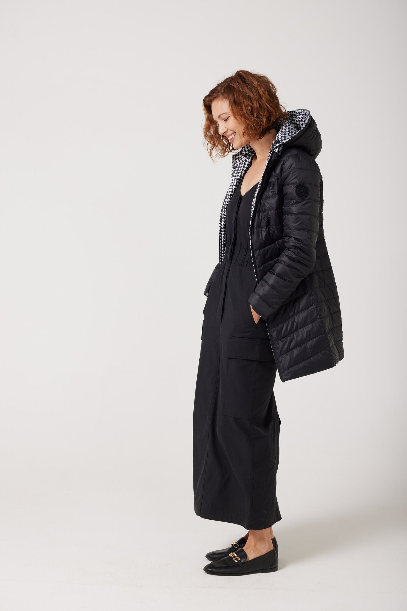 Women’s houndstooth print and midnight black reversible insulated parka with hood, warm winter parka perfect for layering in Australia’s cooler weather — Midnight x Houndstooth Classic Parka™