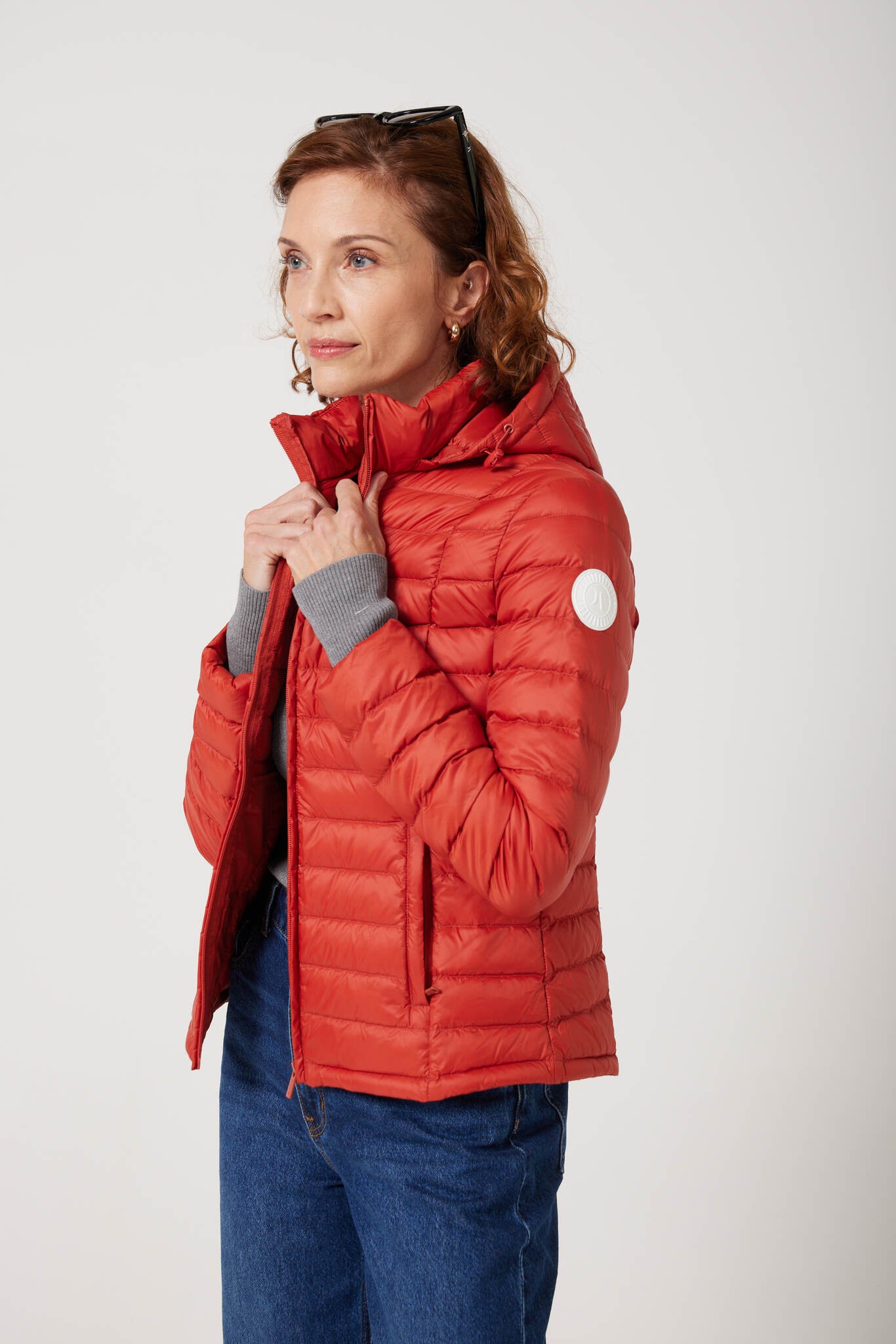 Women’s Rust Classic Jacket™ in vibrant red, stylish lightweight puffer jacket for everyday wear and seasonal outerwear in Australia