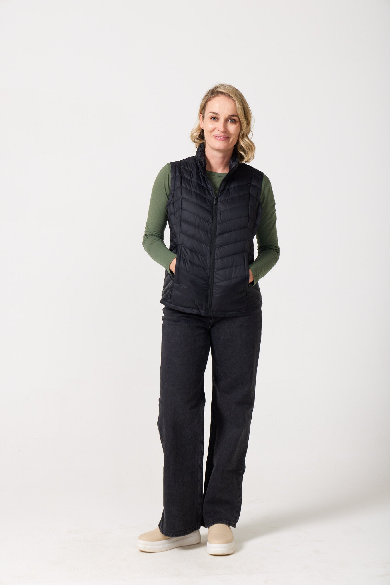 Midnight Classic Gilet™ — women’s classic sleeveless puffer vest in timeless midnight black, perfect for layering across seasons in Australia.