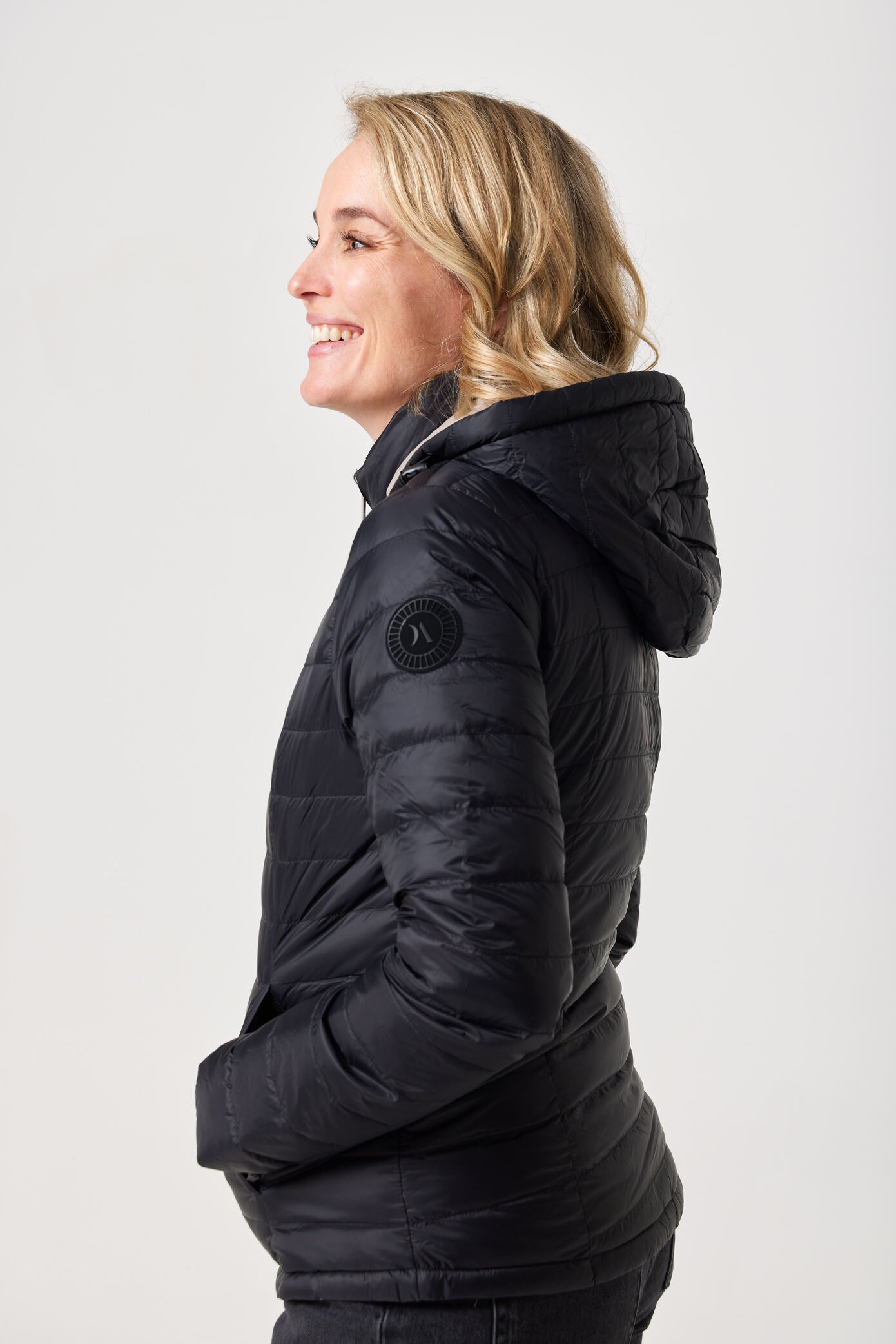 Women’s Ebony x Ivory Classic Jacket™ reversible puffer in beige and black, lightweight and versatile jacket for everyday wear in Australia
