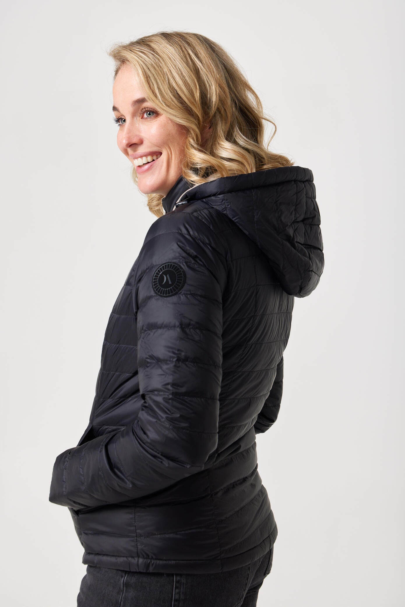 Women’s Ebony x Ivory Classic Jacket™ reversible puffer in beige and black, lightweight and versatile jacket for everyday wear in Australia