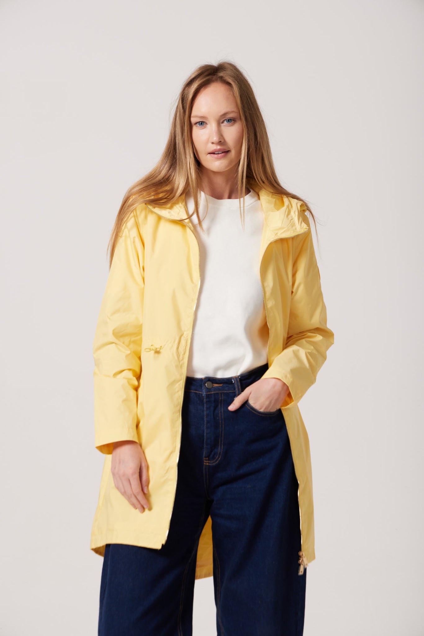 The Limoncello Edition lemon yellow hooded raincoat, modern lightweight waterproof raincoat perfect for Australia’s weather and rain