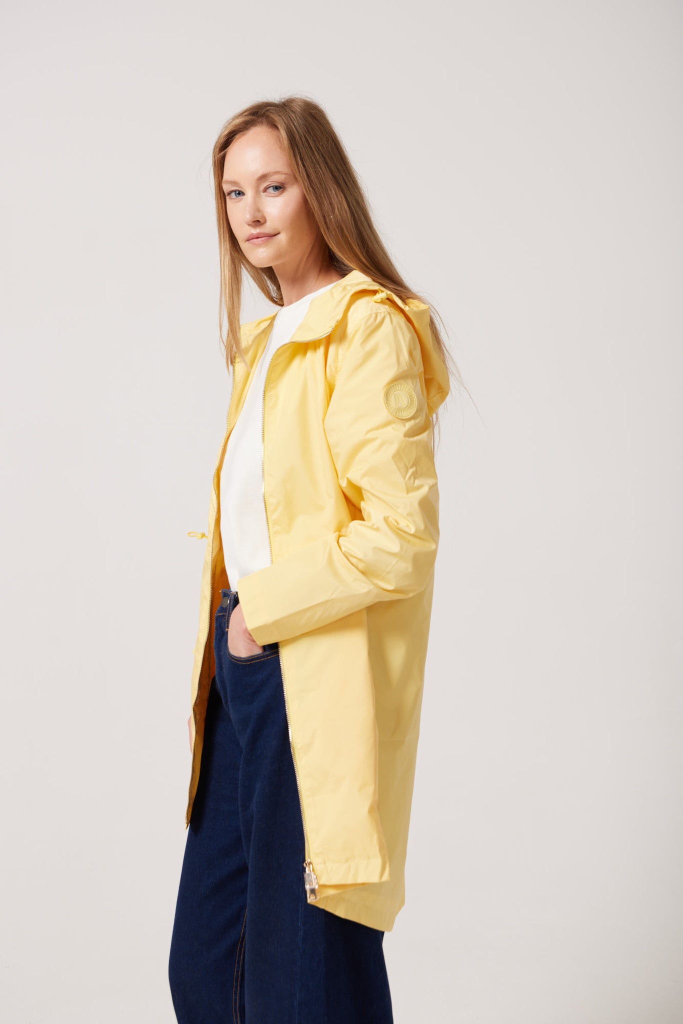 The Limoncello Edition lemon yellow hooded raincoat, modern lightweight waterproof raincoat perfect for Australia’s weather and rain