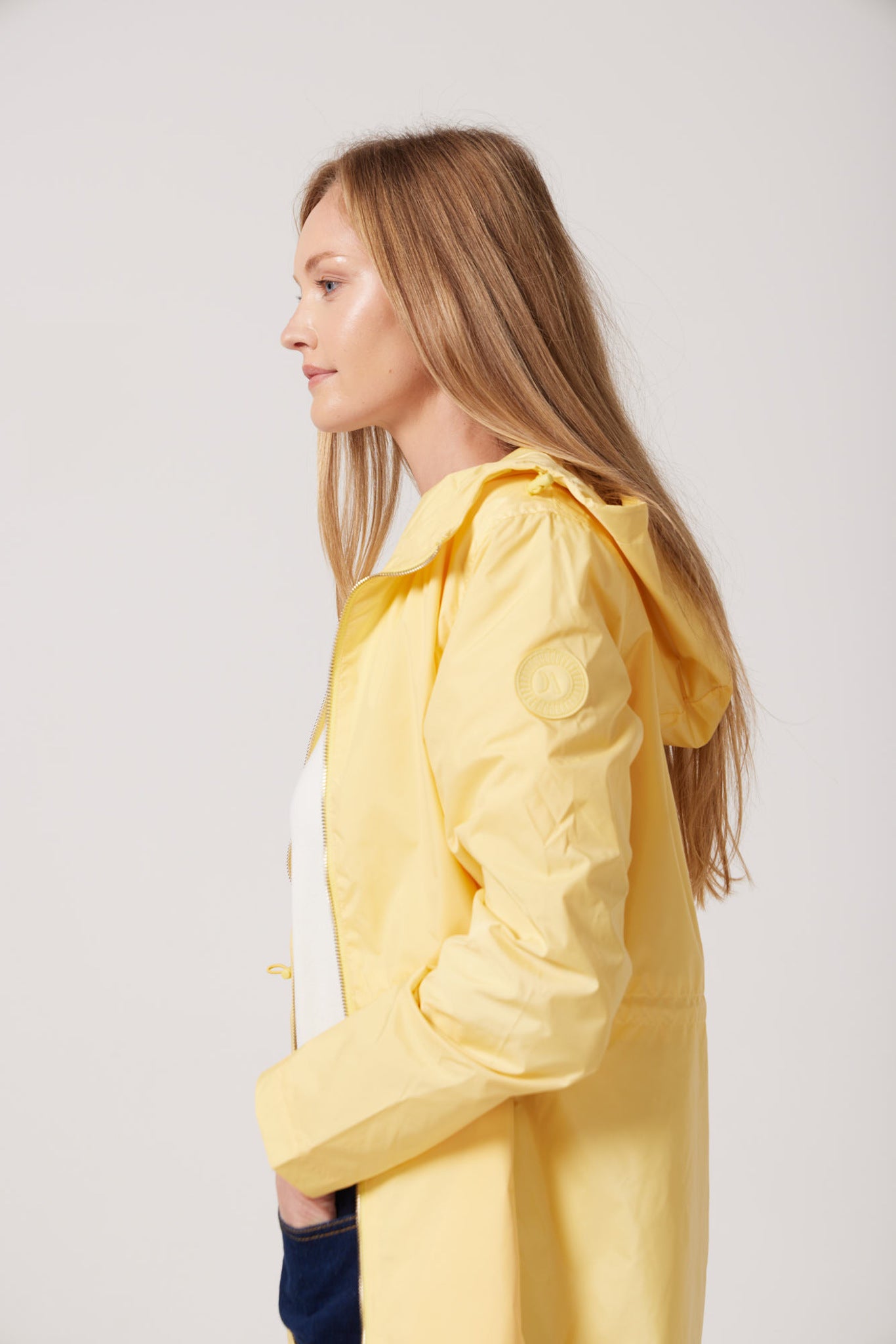 The Limoncello Edition lemon yellow hooded raincoat, modern lightweight waterproof raincoat perfect for Australia’s weather and rain