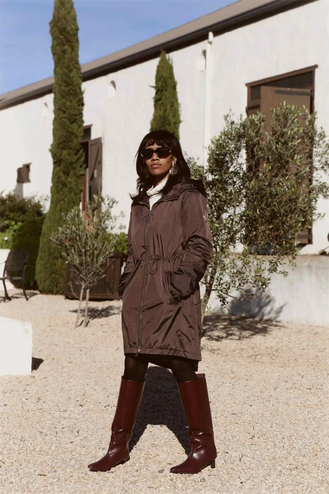 Truffle Haze dark brown hooded raincoat, modern lightweight waterproof raincoat perfect for Australia’s changing weather and rain