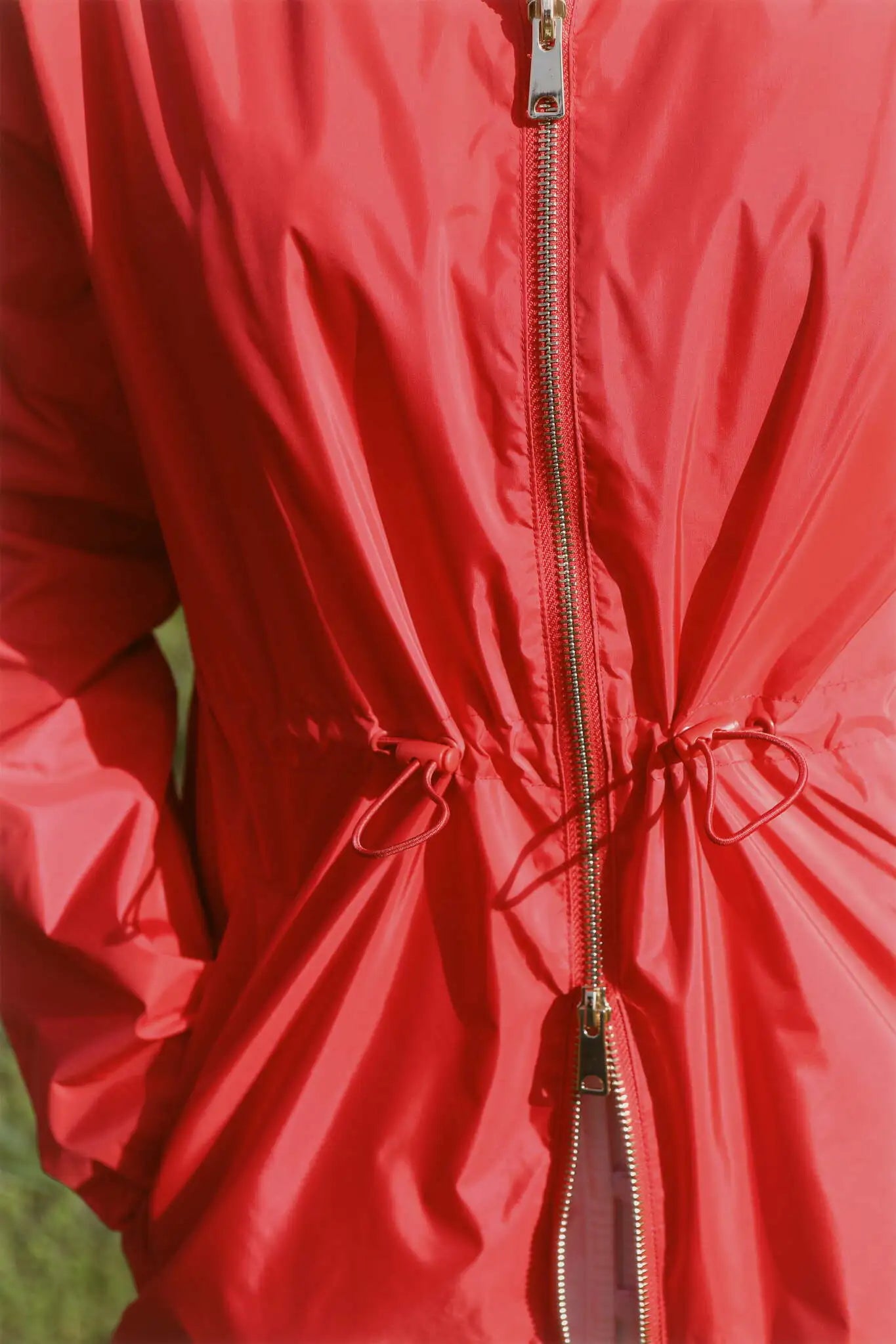 Lipstick Crush No 5 bright red hooded raincoat, modern lightweight waterproof raincoat perfect for wet weather in Australia