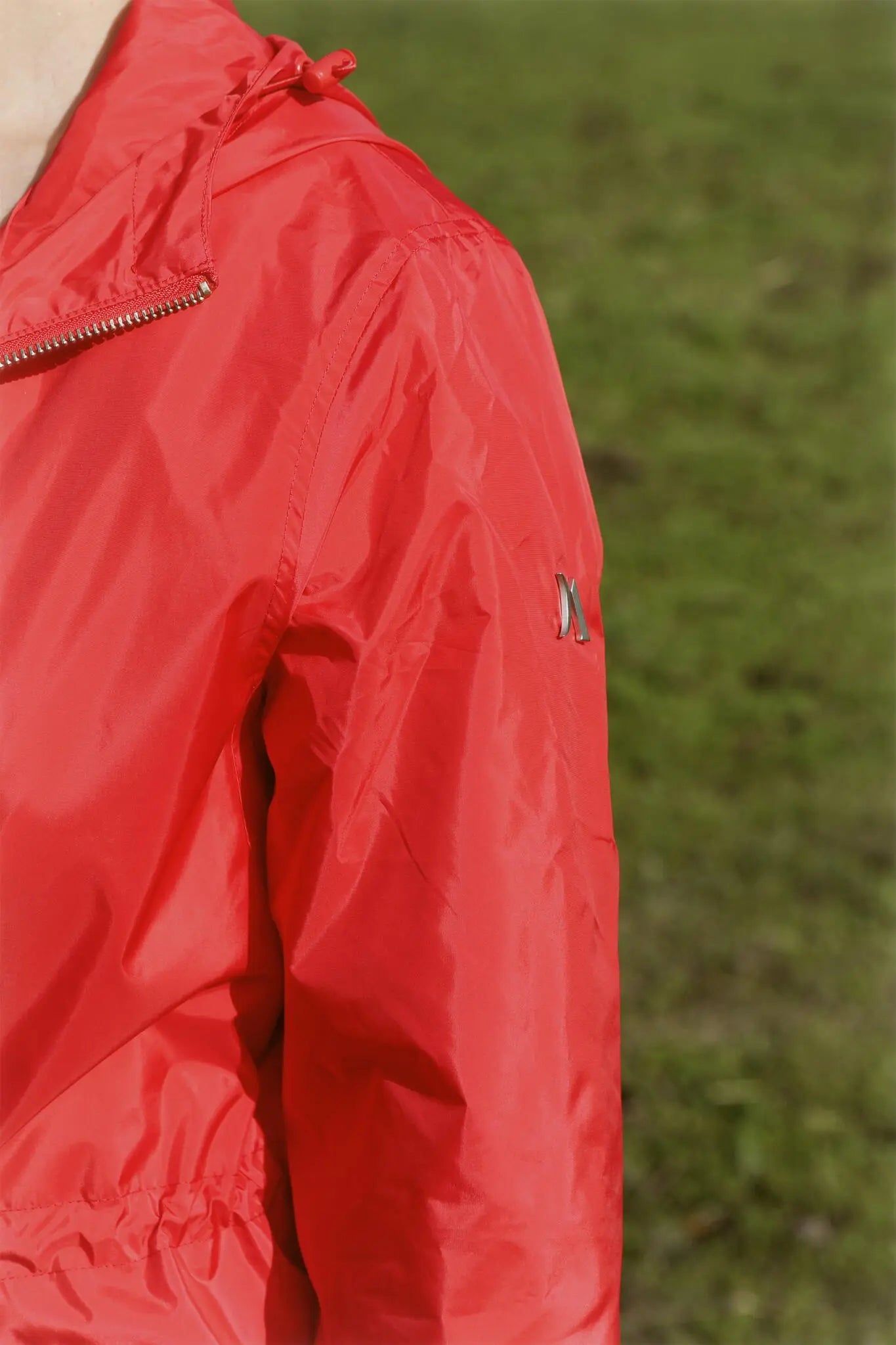 Lipstick Crush No 5 bright red hooded raincoat, modern lightweight waterproof raincoat perfect for wet weather in Australia