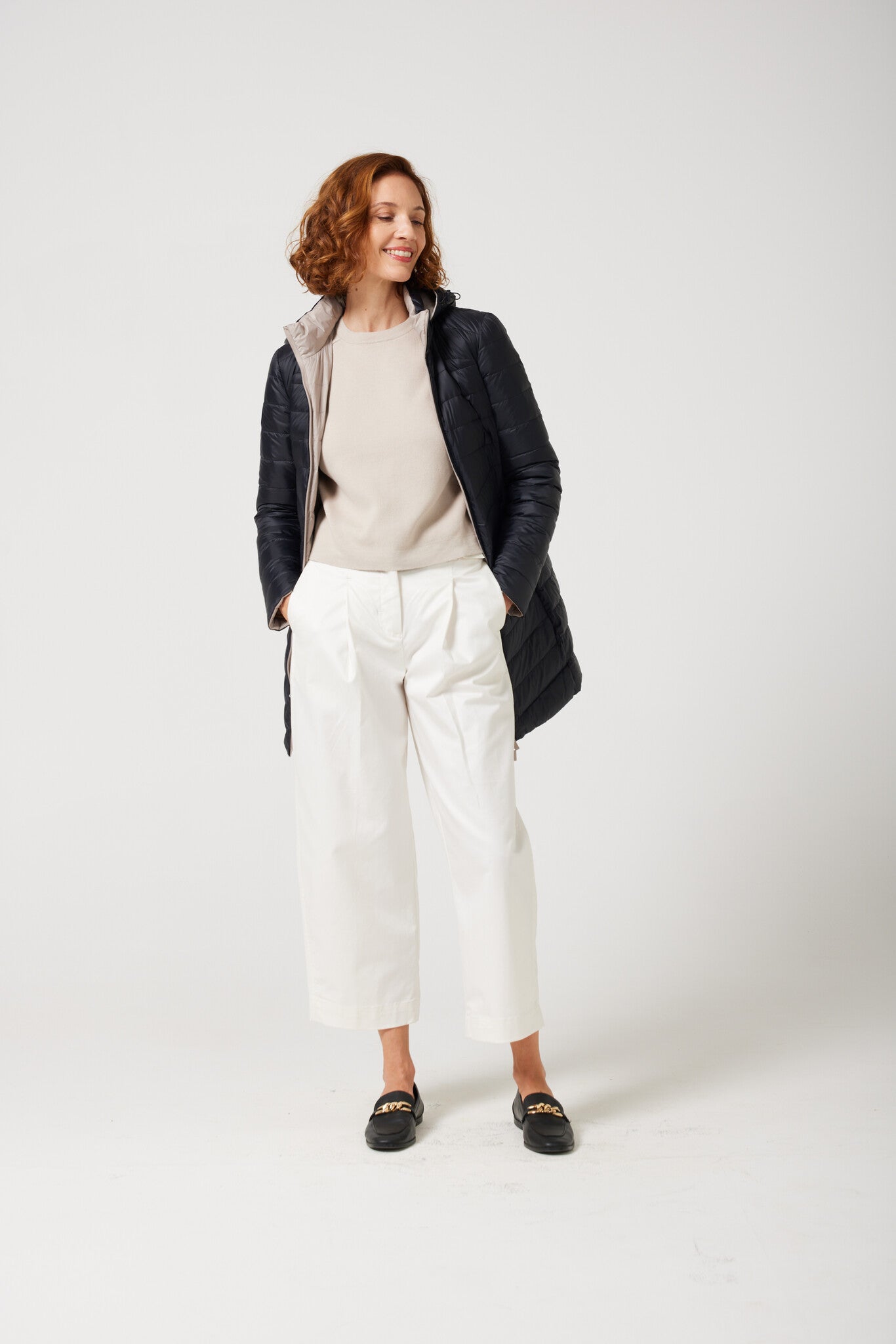 Women’s ebony black and ivory reversible insulated parka with hood, warm winter parka perfect for layering in Australia’s cooler weather — Ebony x Ivory Classic Parka™