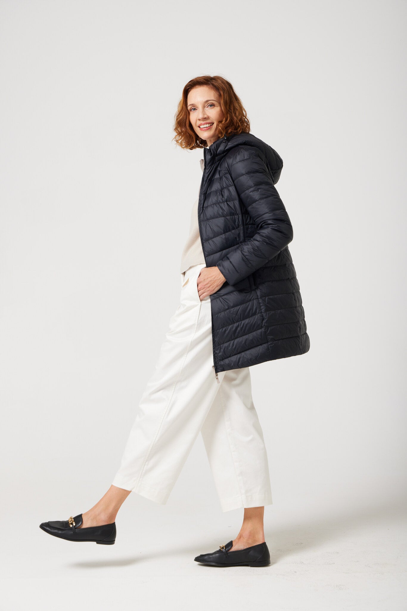 Women’s ebony black and ivory reversible insulated parka with hood, warm winter parka perfect for layering in Australia’s cooler weather — Ebony x Ivory Classic Parka™