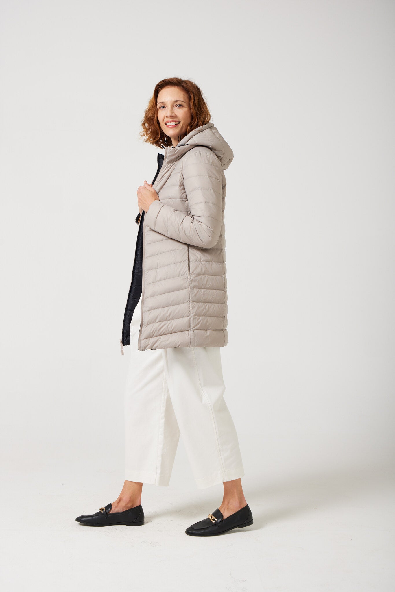 Women’s ebony black and ivory reversible insulated parka with hood, warm winter parka perfect for layering in Australia’s cooler weather — Ebony x Ivory Classic Parka™