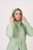 Madame Verde Vol 1 mint green hooded raincoat, lightweight waterproof jacket perfect for wet weather in Australia.