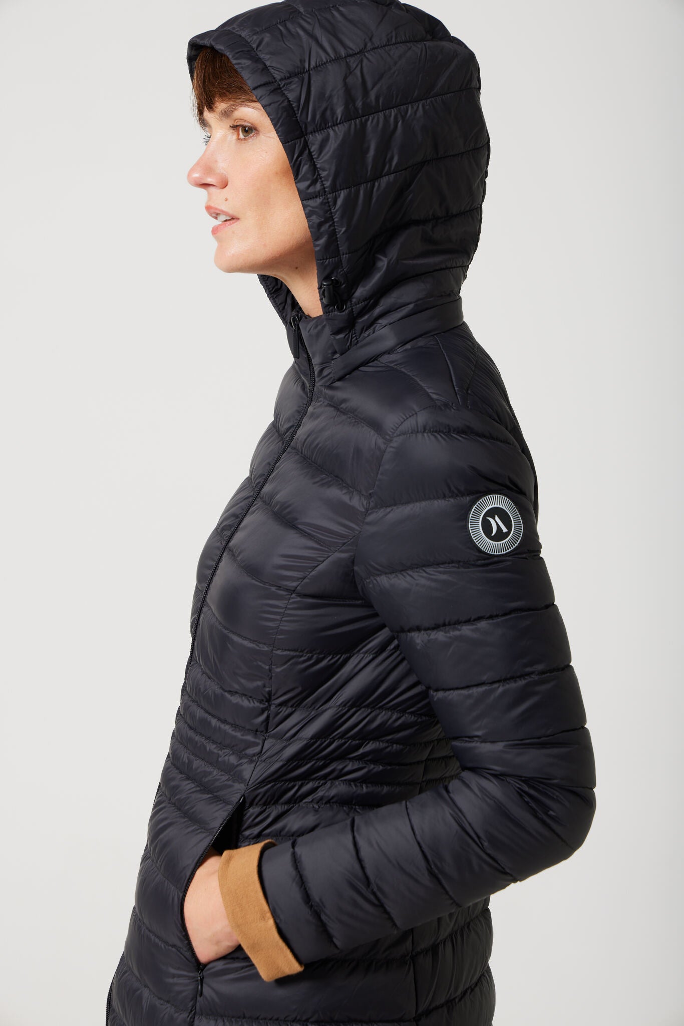 Women’s midnight black insulated midi parka with hood, warm winter parka perfect for layering in Australia’s cooler weather — Midnight Midi Parka™