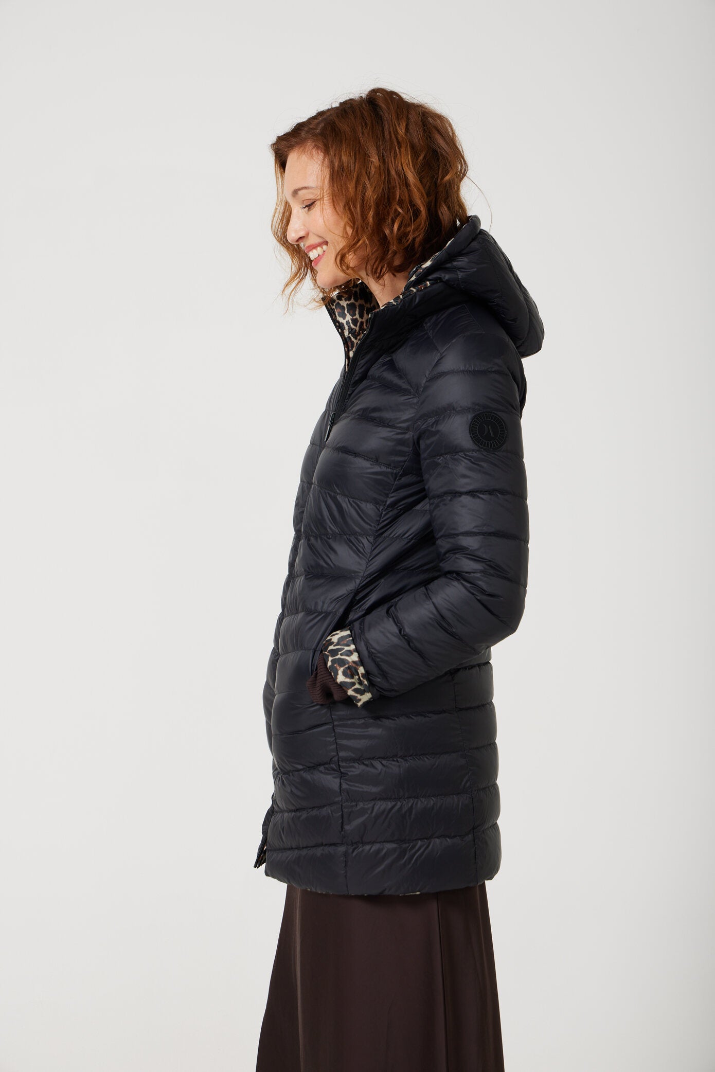Women’s leopard print and midnight black reversible insulated parka with hood, warm winter parka perfect for layering in Australia’s cooler weather — Midnight x Leopard Classic Parka™