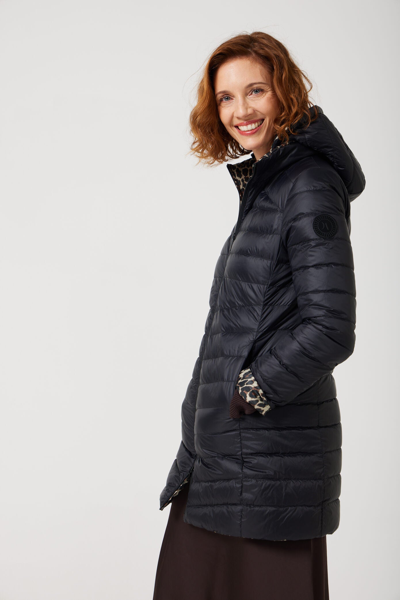 Women’s leopard print and midnight black reversible insulated parka with hood, warm winter parka perfect for layering in Australia’s cooler weather — Midnight x Leopard Classic Parka™