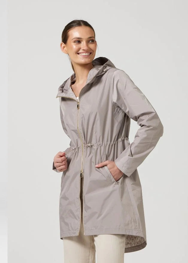 The Cairo Sands beige hooded raincoat, modern lightweight waterproof raincoat perfect for Australia’s weather and rain