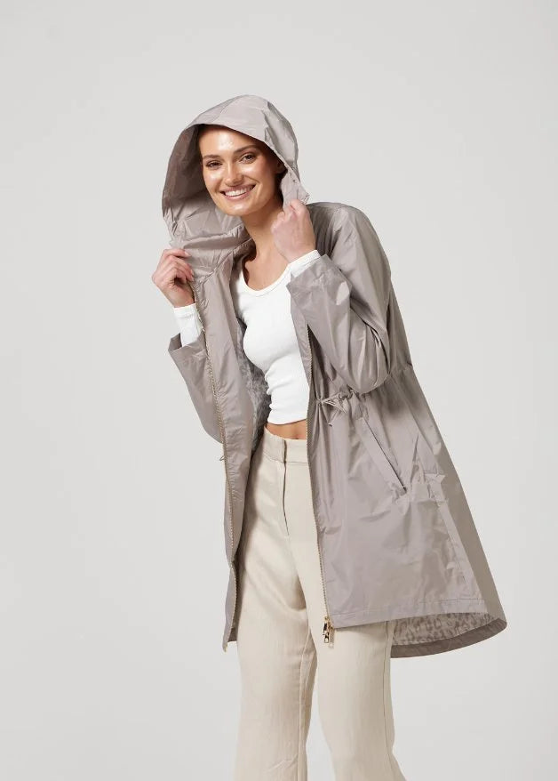 The Cairo Sands beige hooded raincoat, modern lightweight waterproof raincoat perfect for Australia’s weather and rain