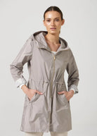 The Cairo Sands beige hooded raincoat, modern lightweight waterproof raincoat perfect for Australia’s weather and rain