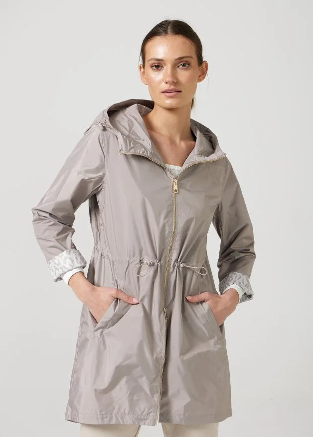 The Cairo Sands beige hooded raincoat, modern lightweight waterproof raincoat perfect for Australia’s weather and rain