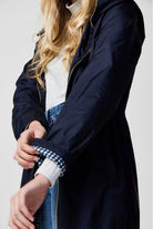 The Oxford Blue navy blue hooded raincoat, modern lightweight waterproof raincoat perfect for Australia’s changing weather and rain