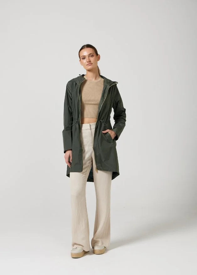 The Juniper deep green hooded raincoat, modern lightweight waterproof raincoat perfect for Australia’s changing weather and rain