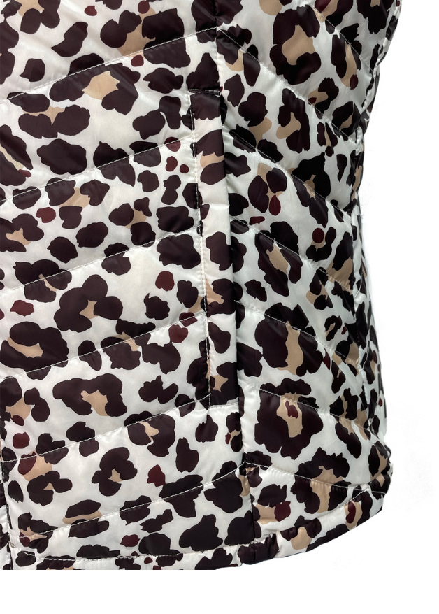 close up of the pocket of a leopard print duck down sleeveless puffer vest