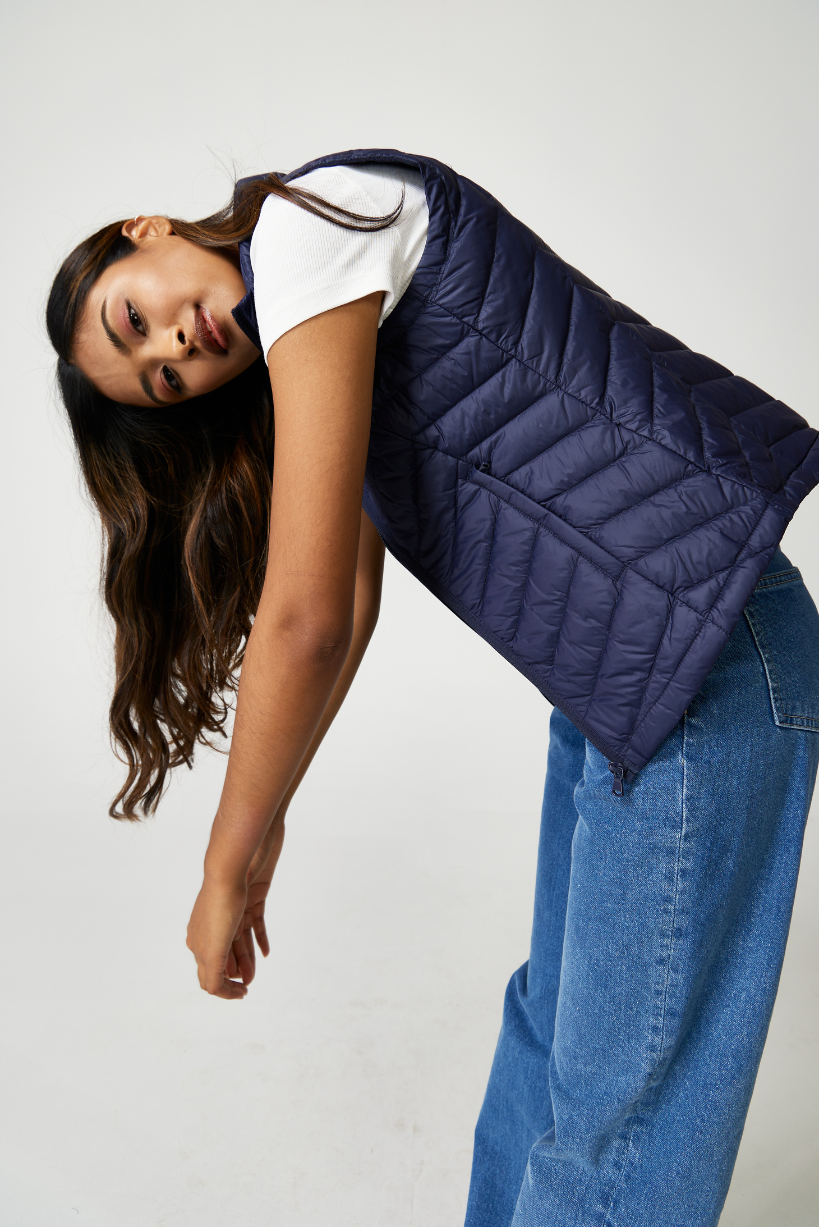 Navy Classic Gilet™ — a sleeveless, lightweight quilted gilet in deep navy blue