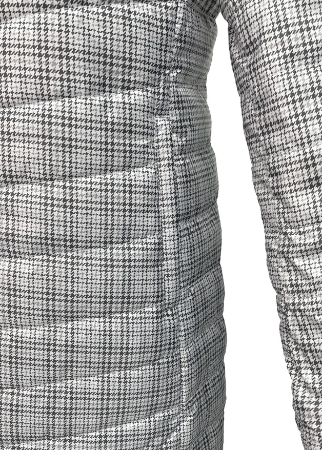 close up of the pocket of a check duck down puffer coat 