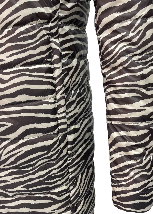 close up of the pocket of a zebra duck down puffer coat 