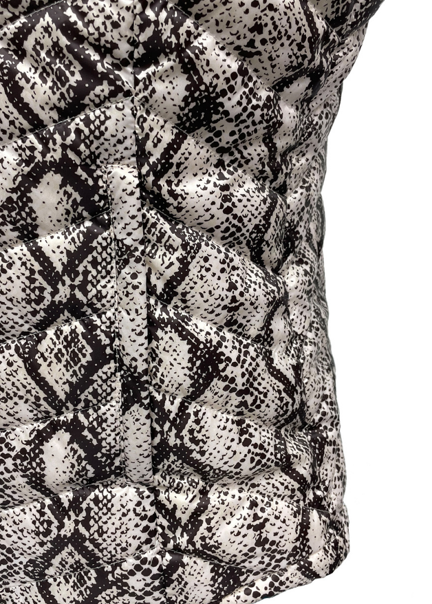 close up of the pocket of a snake skin duck down puffer vest